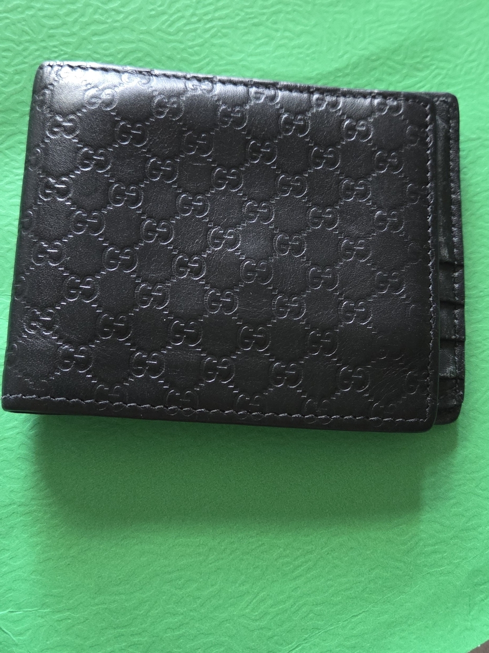 Gucci Black Embossed Leather Bi-Fold Wallet